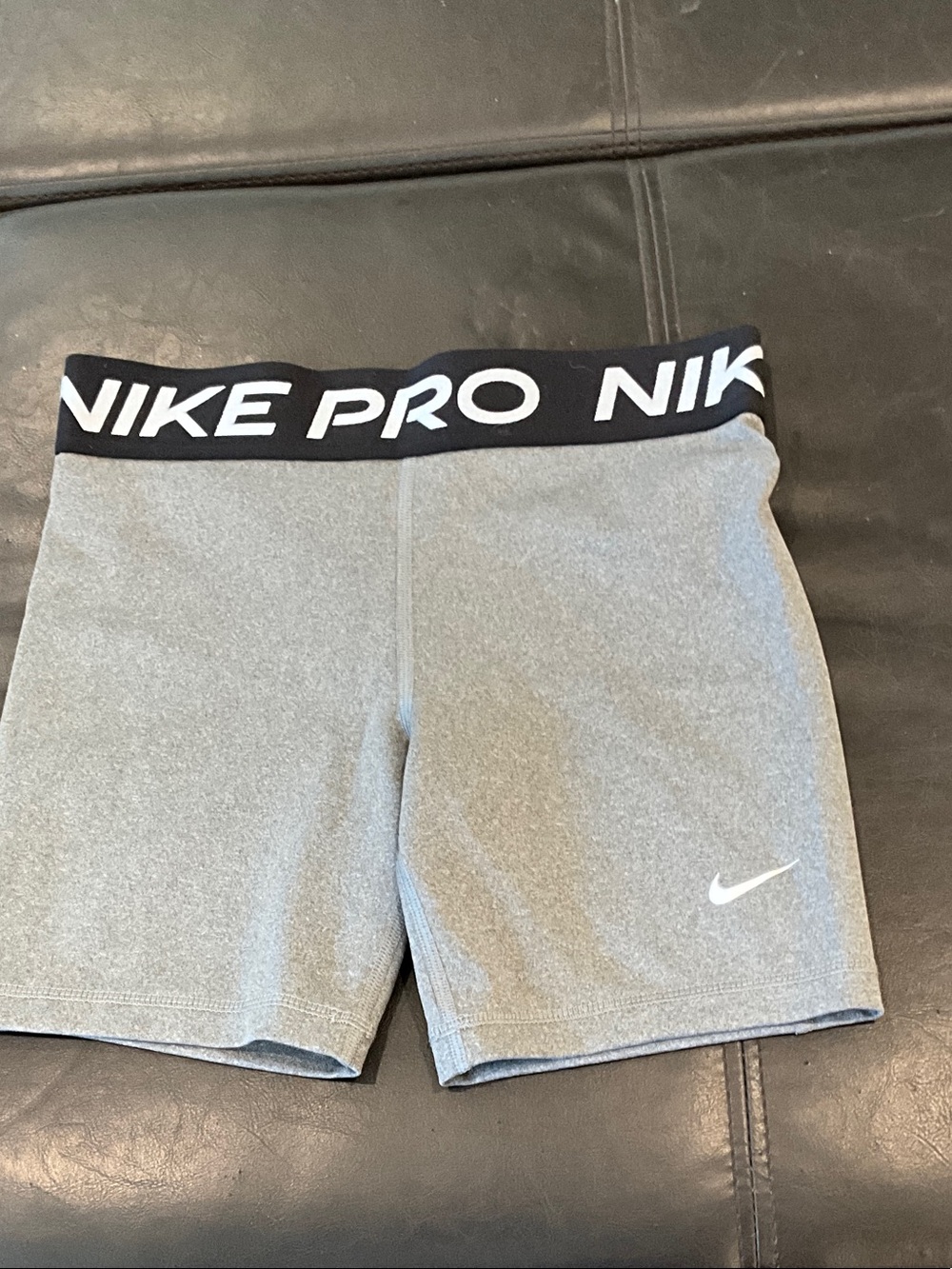 Kids Gray Nike Pro Compression Shorts with Black Logo Waistband